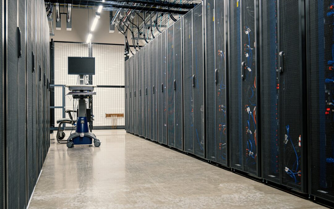 Photo of a computer inside of a data center space that houses hardware storage
